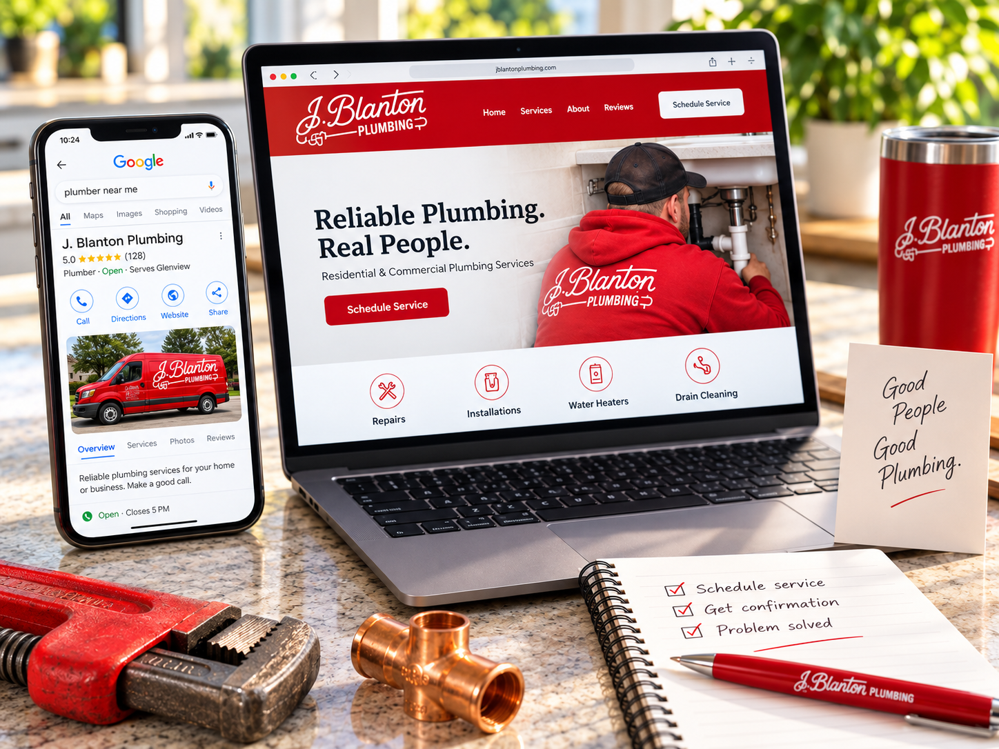 J. Blanton Plumbing lead flow: Google search result on a phone, company website on a laptop, branded tumbler, notepad, pen, and plumbing tools on a countertop